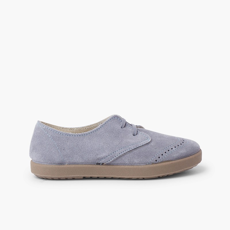 Derbies en suède avec motifs piqués sur le bout Bleu