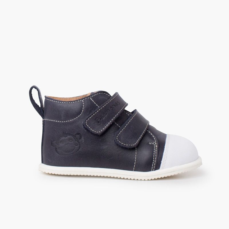 Bottine sport en cuir à bout blanc