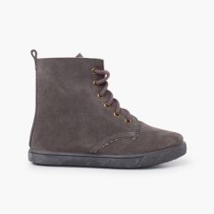 Botte en peau de mouton avec lacets latéraux à glissière Gris