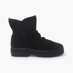 Bottes en suède à effet froissé Noir