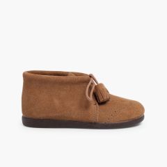 Bottes en suède à Pompons  Taupe