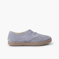 Derbies en suède avec motifs piqués sur le bout Bleu