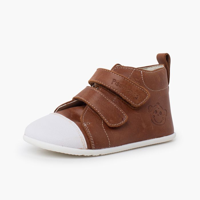 Bottine sport en cuir à bout blanc