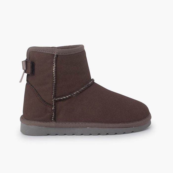 Bottes de style australien avec un nœud à l'arrière